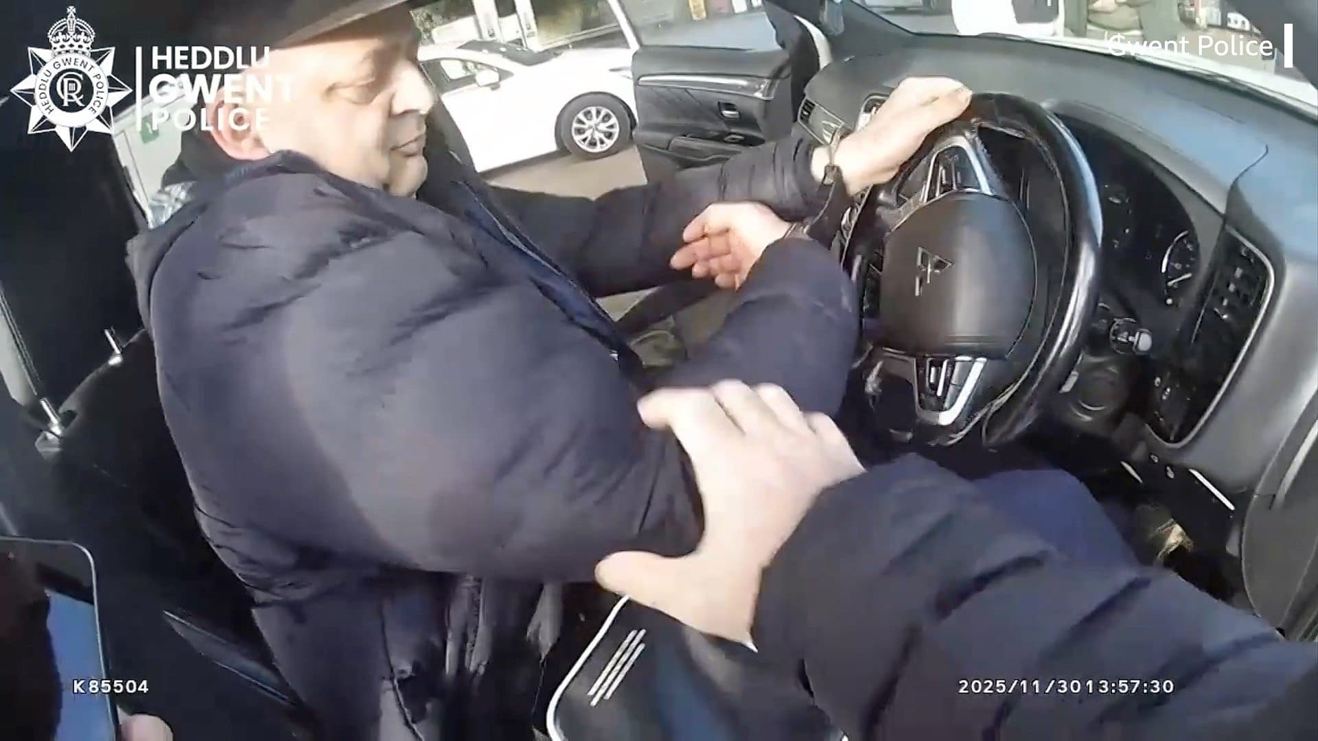 Driver jailed after getaway attempt while handcuffed
