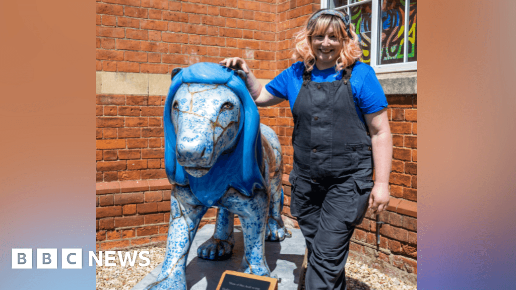 Artist's delight as lion statue 'comes home'
