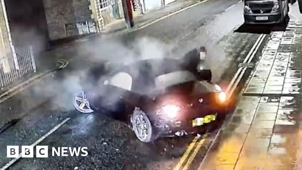 Car drives into a house